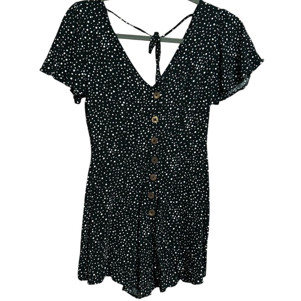 Black & white polkadot romper with button up detail, tie back detail